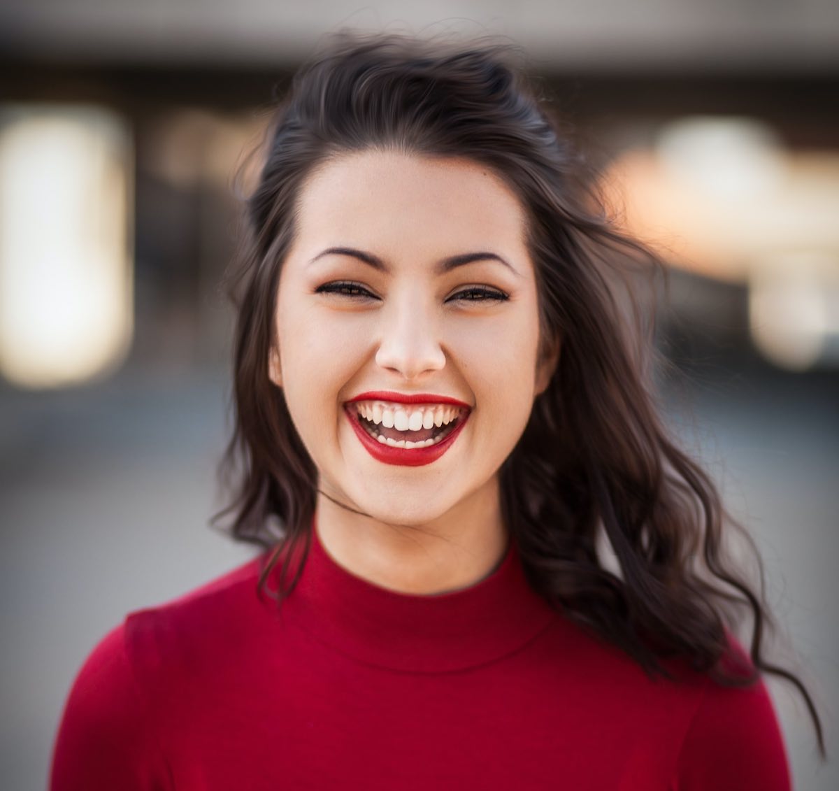 wide aperture shot of woman outdoors.