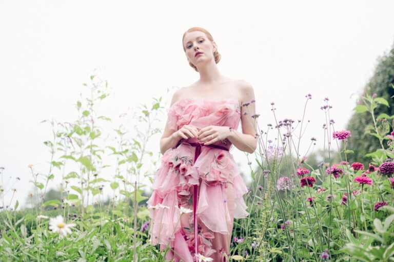 An image of a woman in a pink dress by Shannon Grant