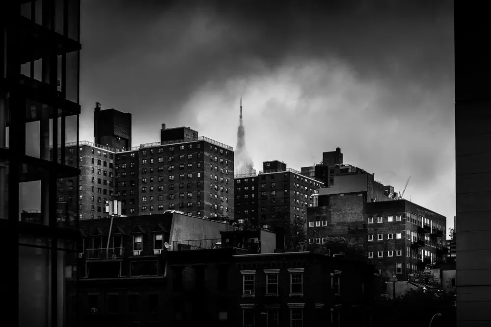 View of foggy cityscape at night.