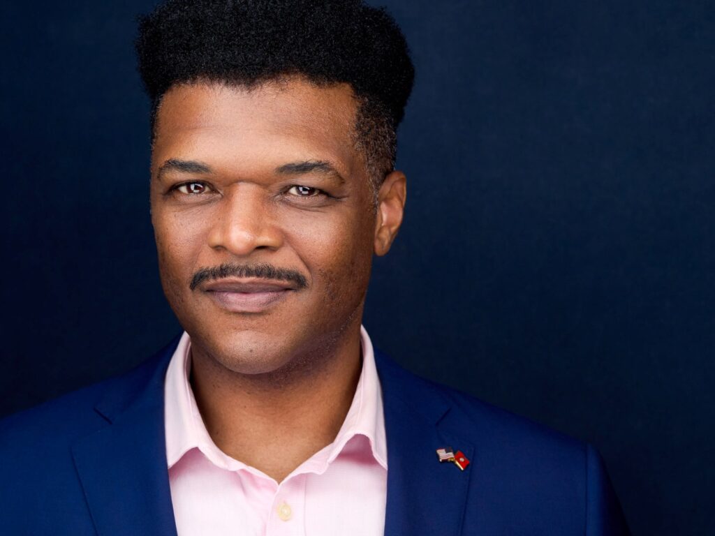 A headshot of a man by Jon Meadows