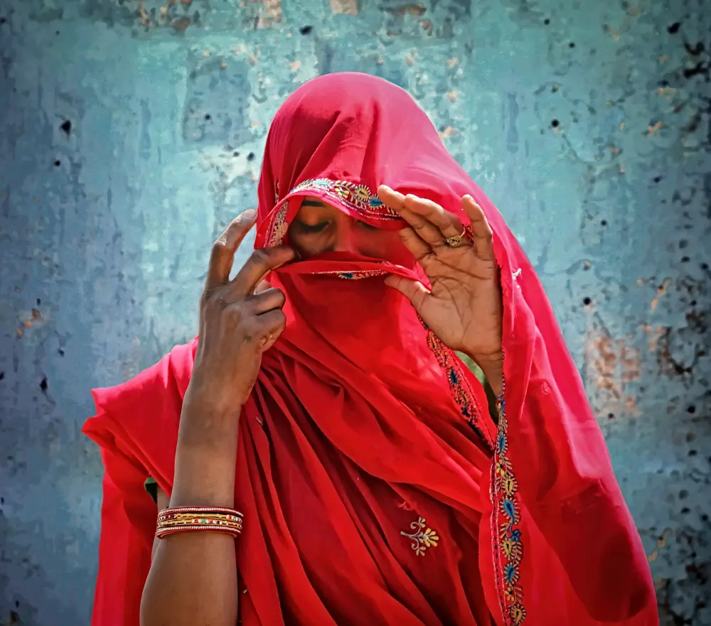 Close-up portrait of Indian woman in traditional clothing. Street portrait showcasing fashion and traditional culture.