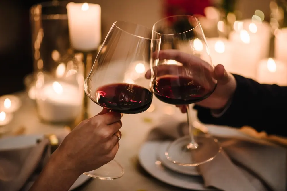 Romantic candlelit dinner scene.