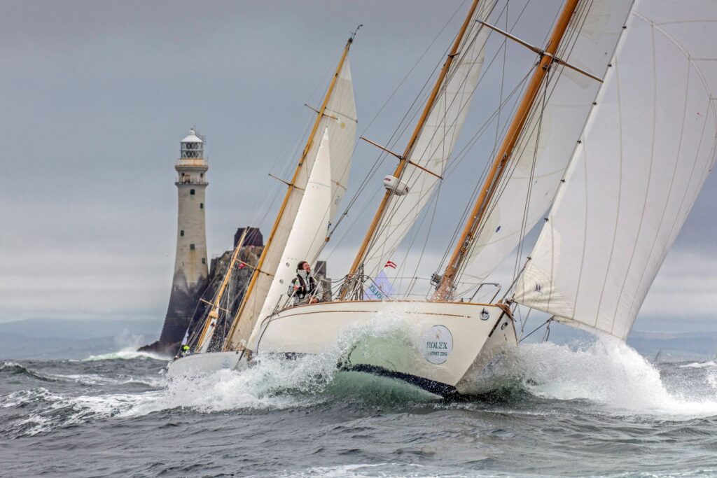 An image of a sailboat in front of a lighthouse by Daniel Forster.