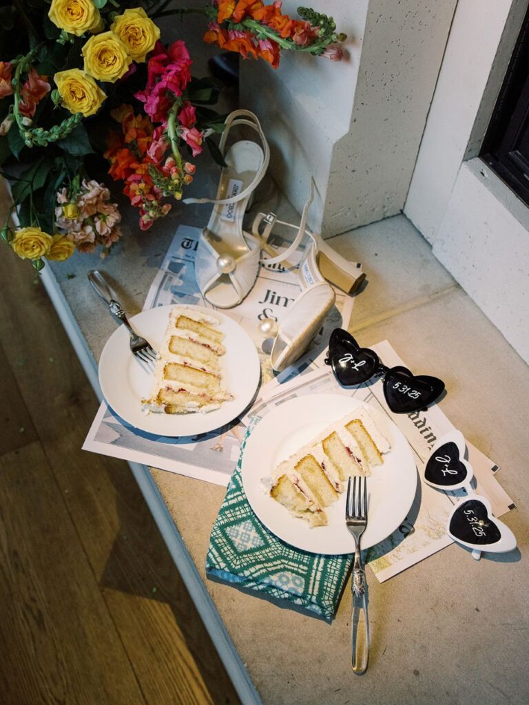 An downward looking image of some cake slices at a wedding by Hannah Bjorndal.