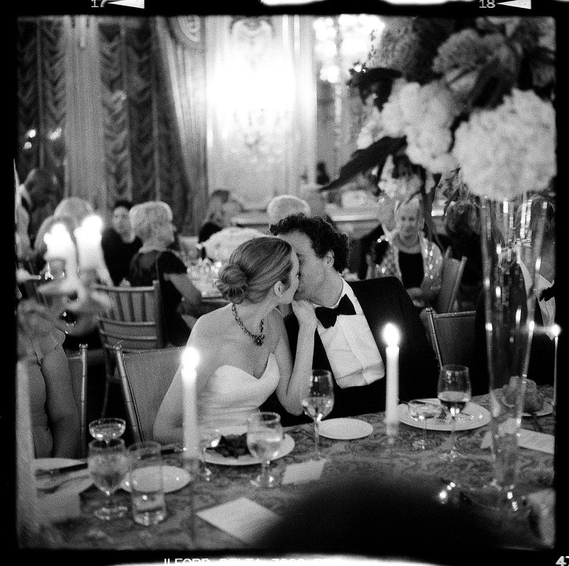 An image of a close moment between a man and a woman photographed by Johnny Martyr.