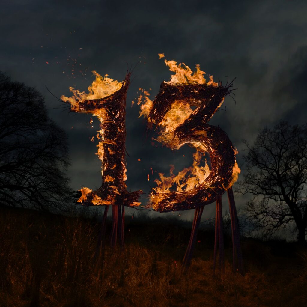 An image of the number 13 on fire by Jonathan Knowles.