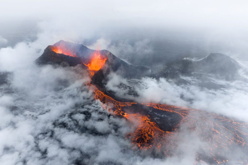 An image of a misty volcano, photographed by Jeroen Van Nieuwenhove.