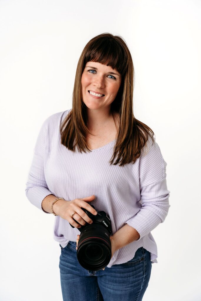 A headshot of family photographer, Kristeen Waddell.