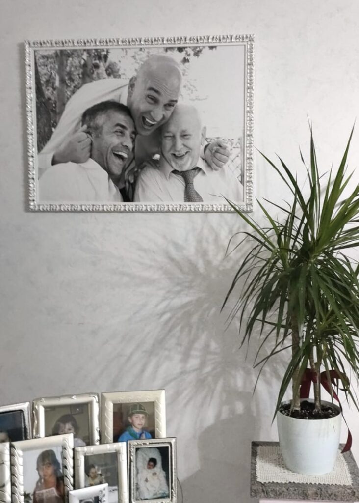 A photo of a photo of Lucrezia's family at a wedding.