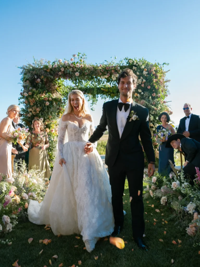 An image of a bride and groom walking back down the aisle.