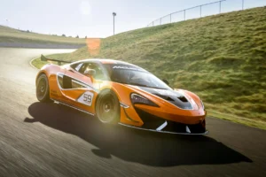 An image of a car racing around a track by Jay Watson