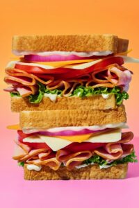 A professional photograph of a sandwich by Rachel Korinek.