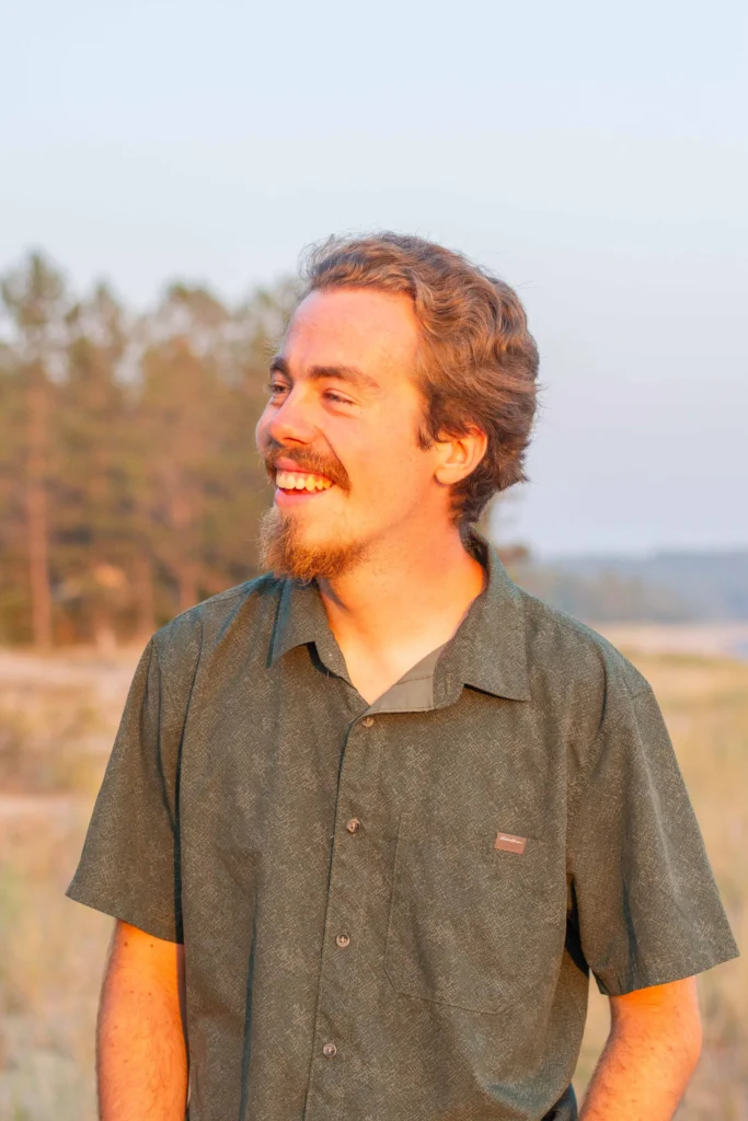 A headshot of Caleb Holdsworth