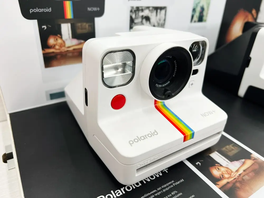 A closeup of a modern Polaroid now+ camera.