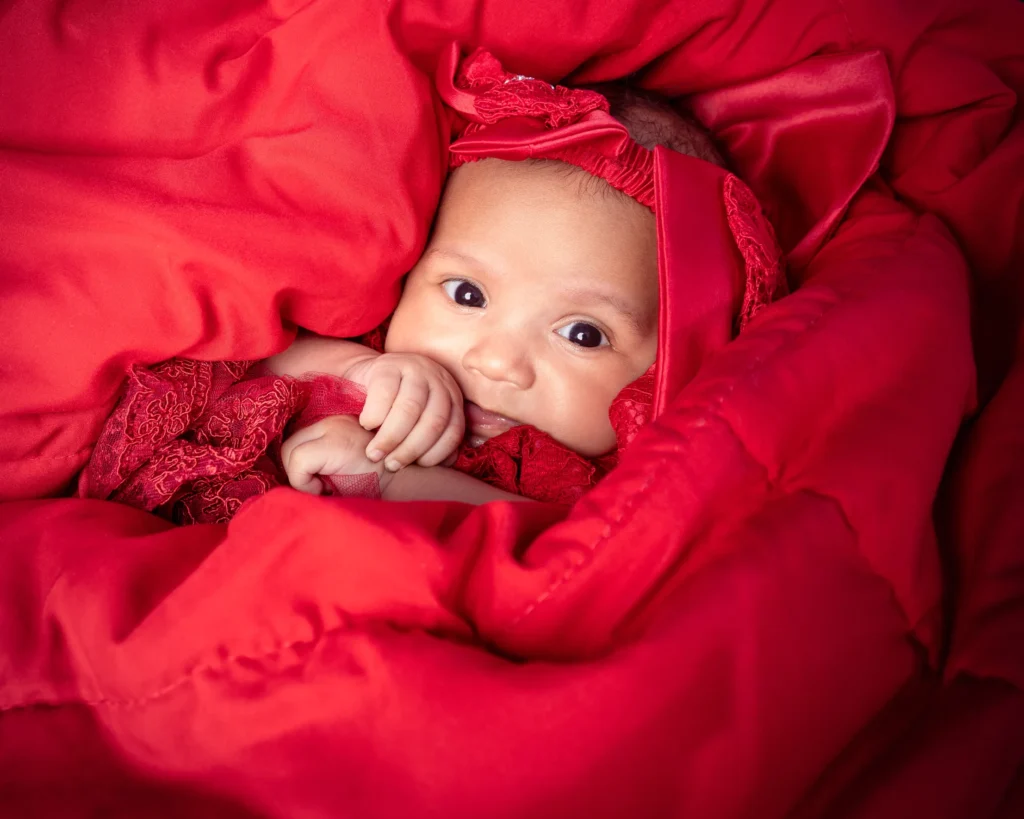 A portrait of a baby by Victor Coker Jr.