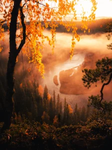 A photo of a sunrise and a river by Kasper Rajasuo