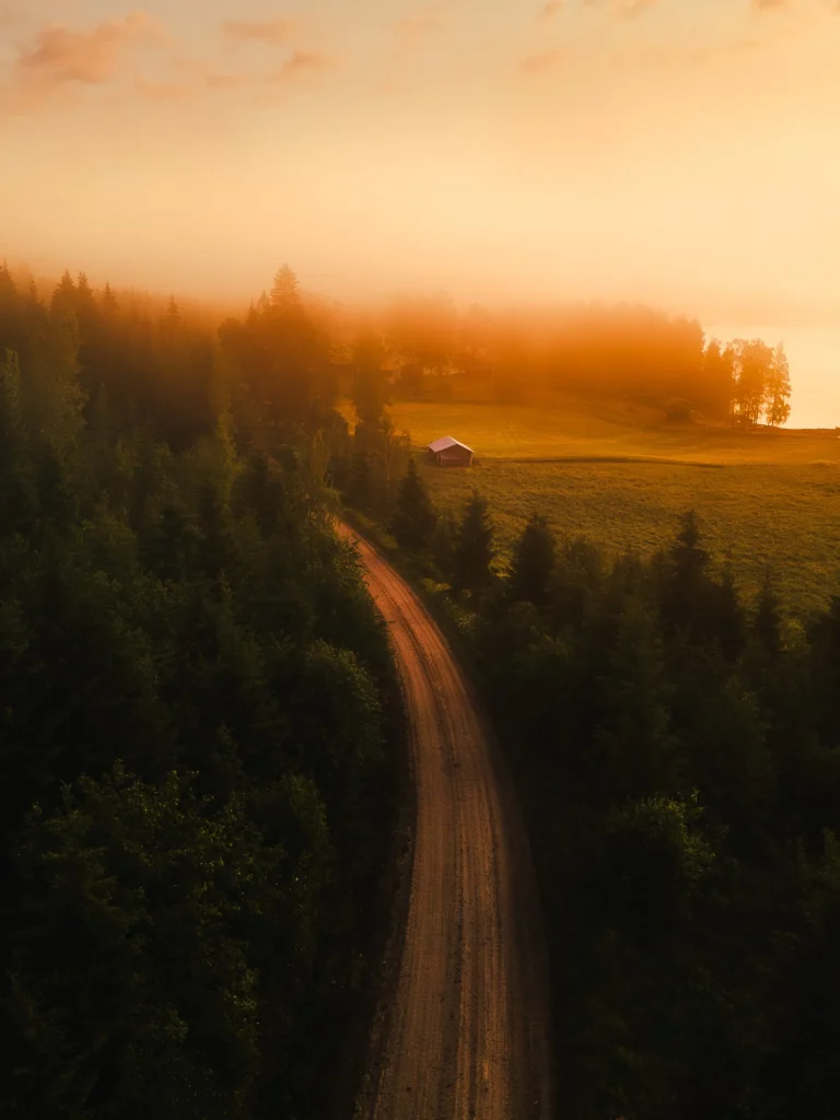 A morning image of a road from an aerial view by Kasper Rajasuo.