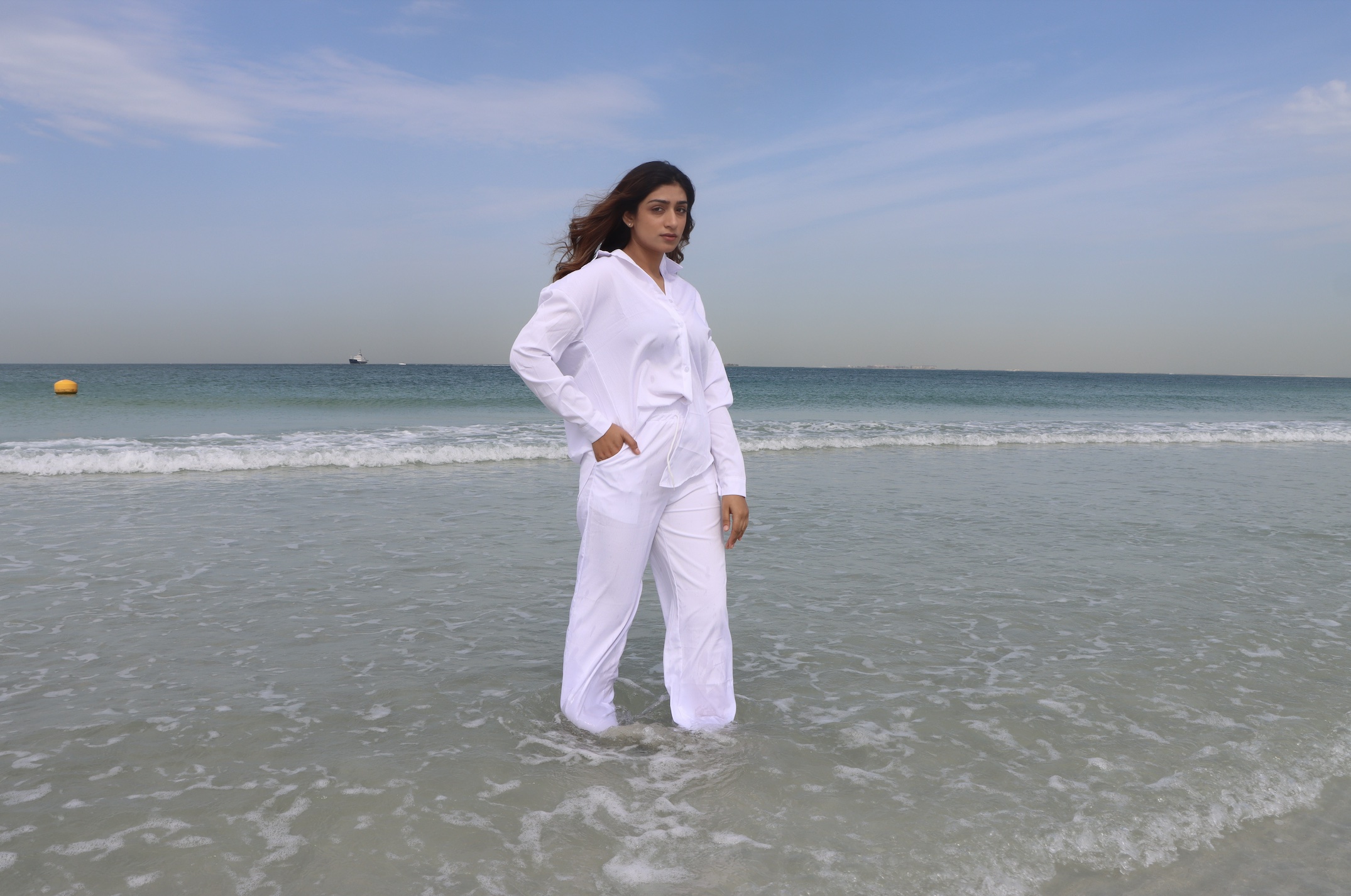 A structured portrait pose where body language appears controlled rather than natural because of too much direction.