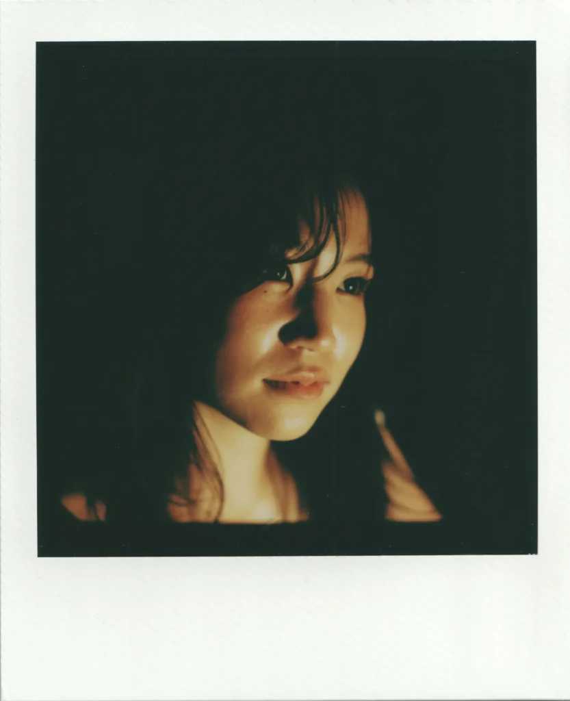 A polaroid scan of a woman by Alin Tolea.