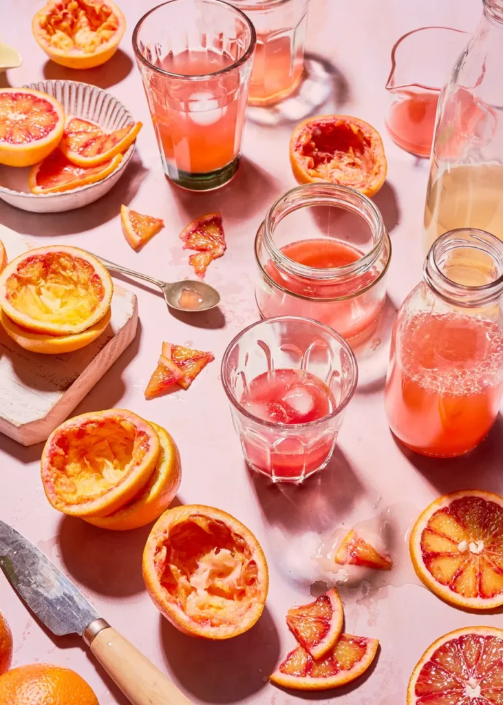 A spread on a table that is blood orange themed photographed by Anusha Stewart.